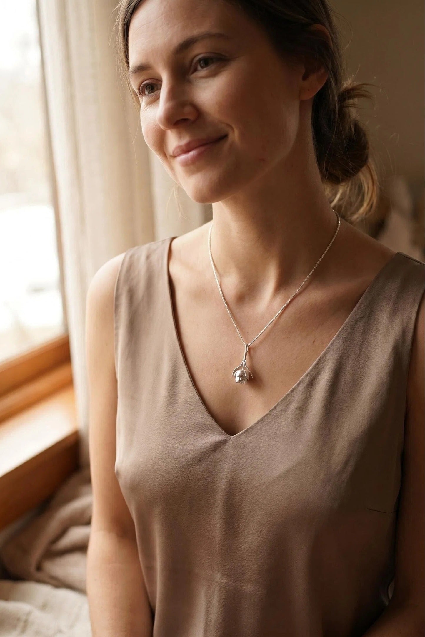 The Kinetic Awakening Bloom Pendant